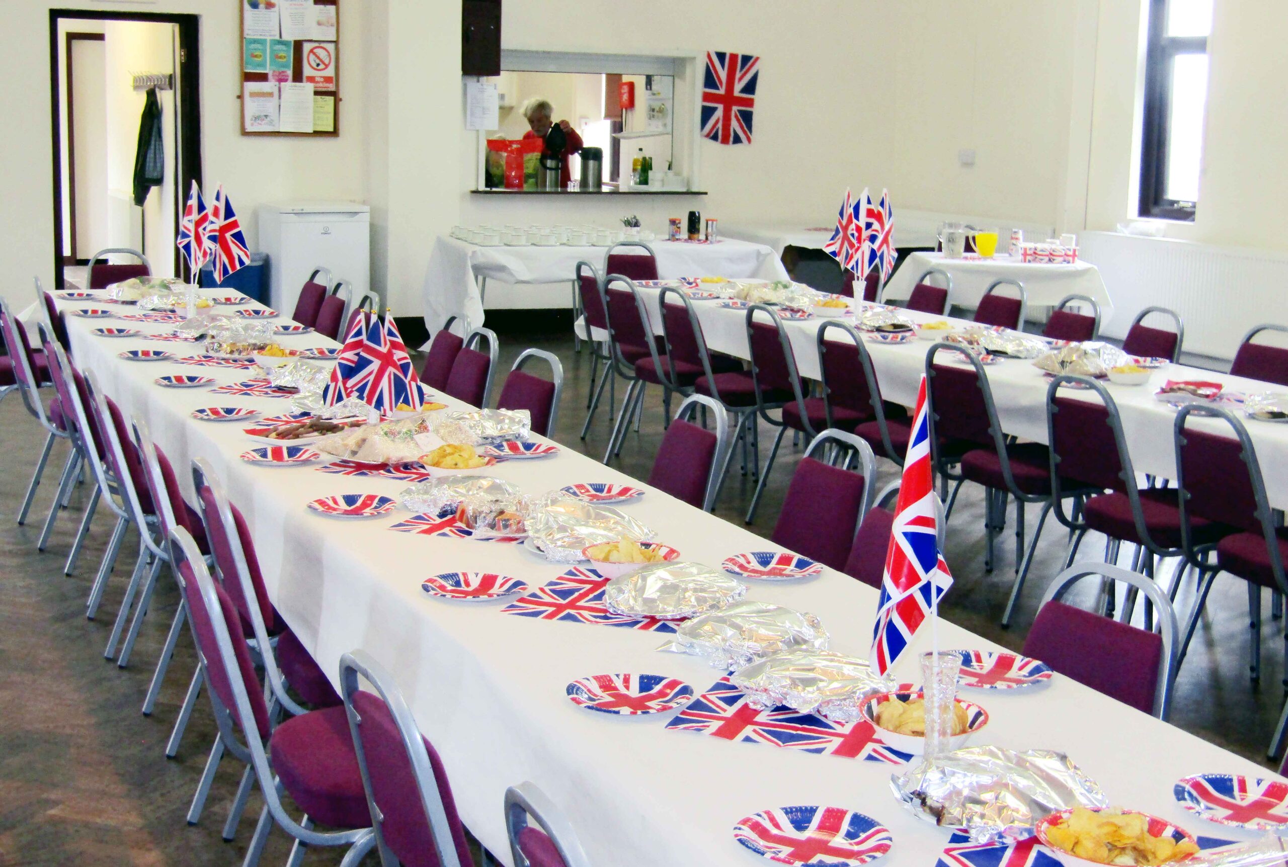 Main hall with chairs and kitchen Mathry main hall